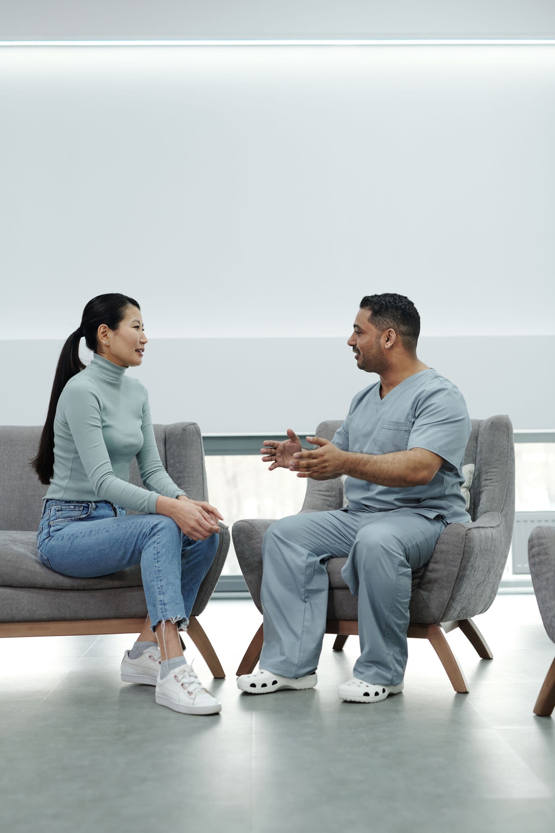 A patient and clinician having a thoughtful conversation
